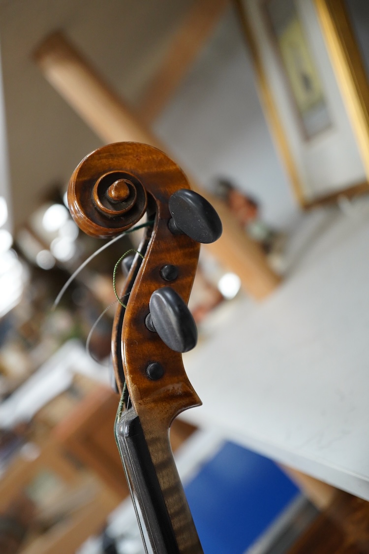 A late 19th century German violin in a Hill & Son oak case, with Hill canvas slip cover, together with an unbranded silver mounted bow, and another, ivory submission ref: 9HJU3B45 and ZC2E1GCP